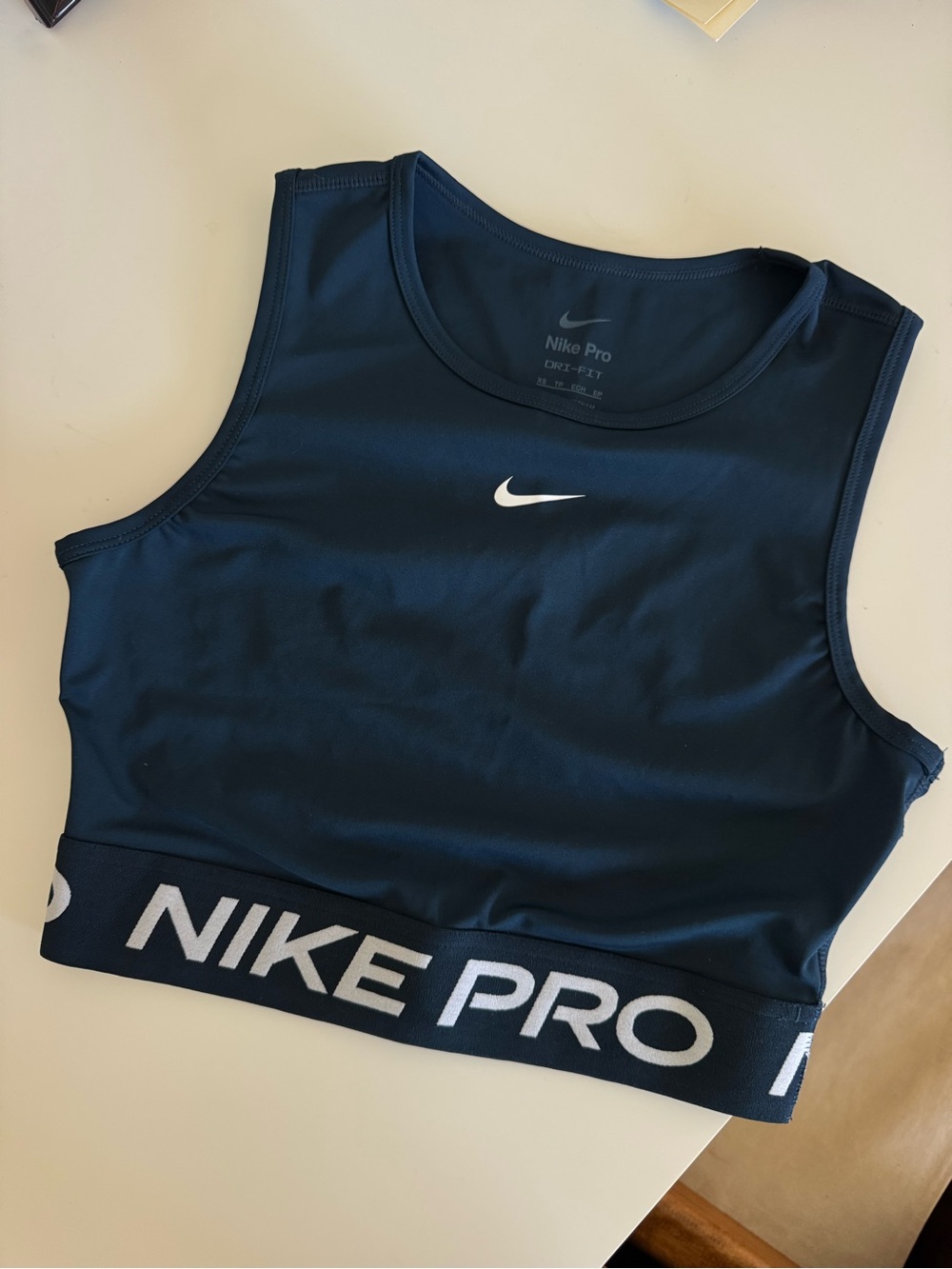 Nike Women's Navy Blue Crop Crop Top with White Logo XS